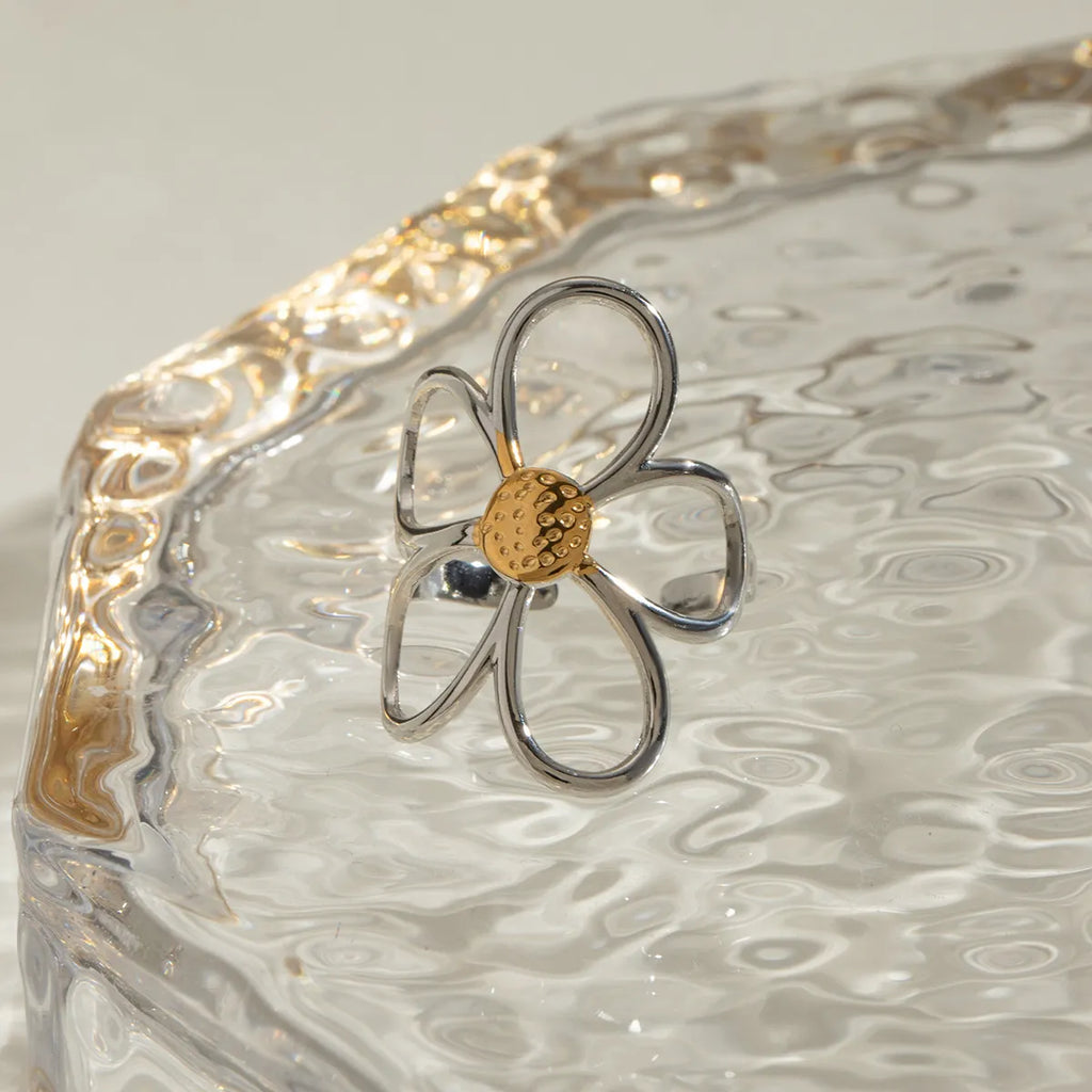 Two-tone daisy flower ring by Shopimist featuring a gold and silver finish with detailed petal design.