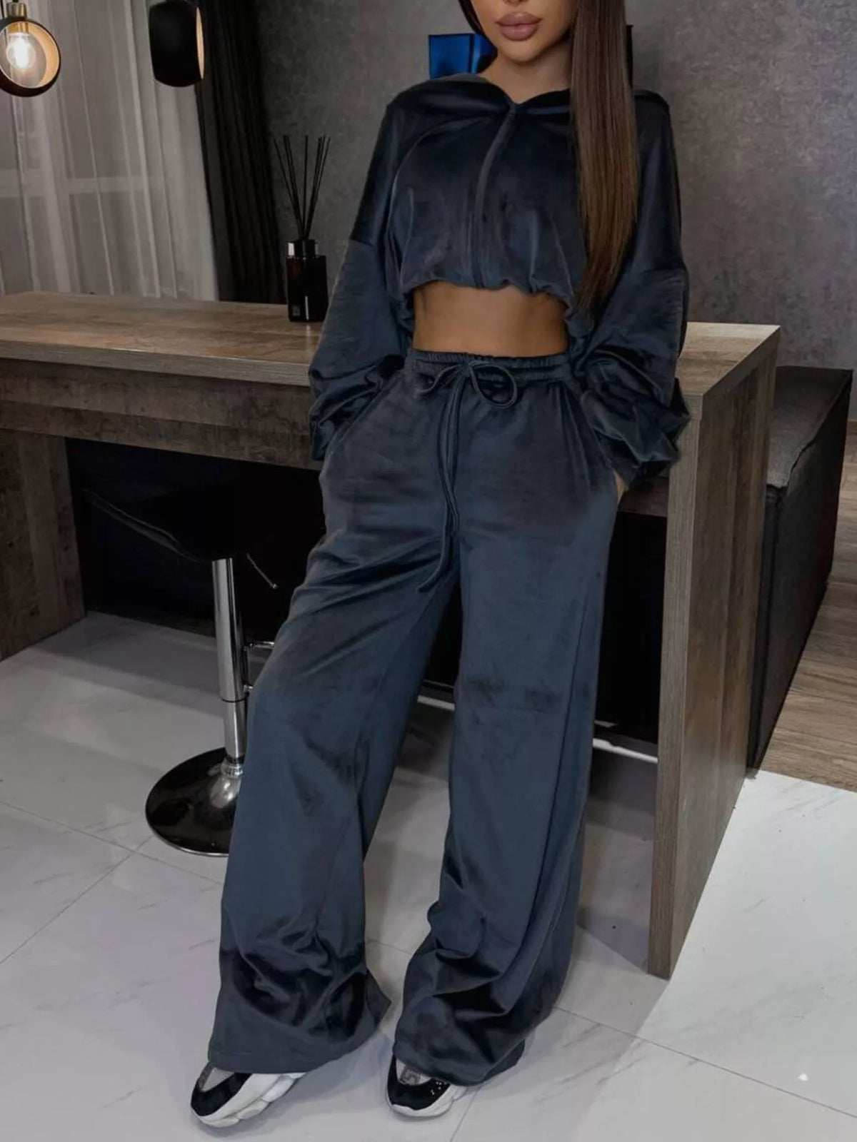 Plush Fashion Hub zip-up cropped outerwear and pants set, featuring a stylish matching athletic outfit with a zip-up top and pants.
