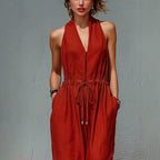 Women's sleeveless halter neck long jumpsuit in solid color, casualwear from Plush Fashion Hub, featuring a stylish fit and relaxed design.