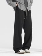 Men's plus size casual loose-fit drawstring pants by Shopimist, shown in a relaxed fit with elastic waistband and comfortable fabric.