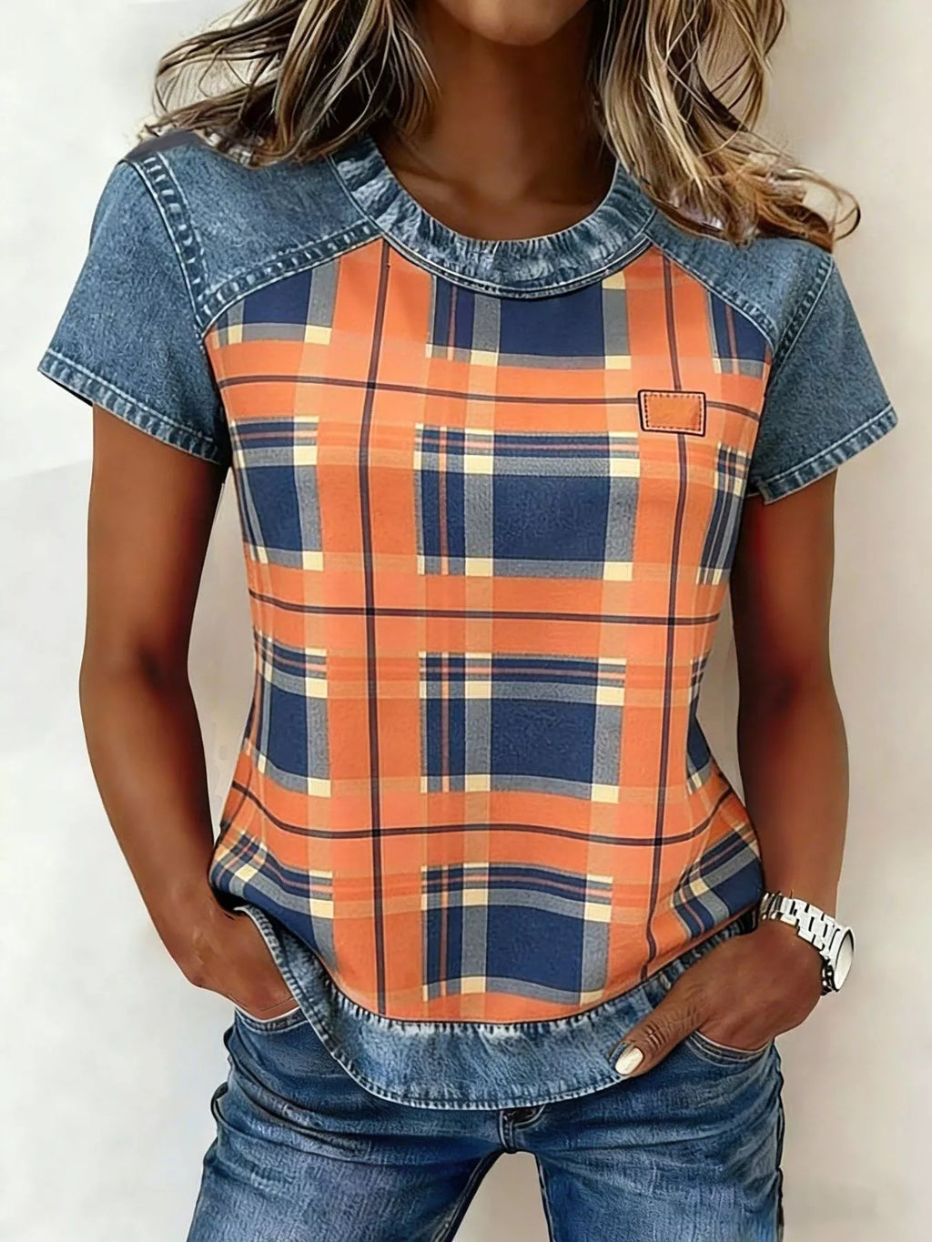 Denim patchwork short sleeve blouse from Plush Fashion Hub with mixed fabric designs and casual fit.