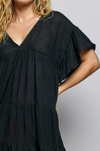 Shopimist POL ruffle shirred V-neck short sleeve cotton dress displayed on a model, featuring a feminine ruffled neckline and lightweight fabric.