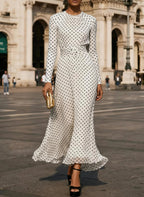 Round neck long sleeve polka dot sheath dress by FitiqueFit, featuring a fitted silhouette and classic polka dot pattern.