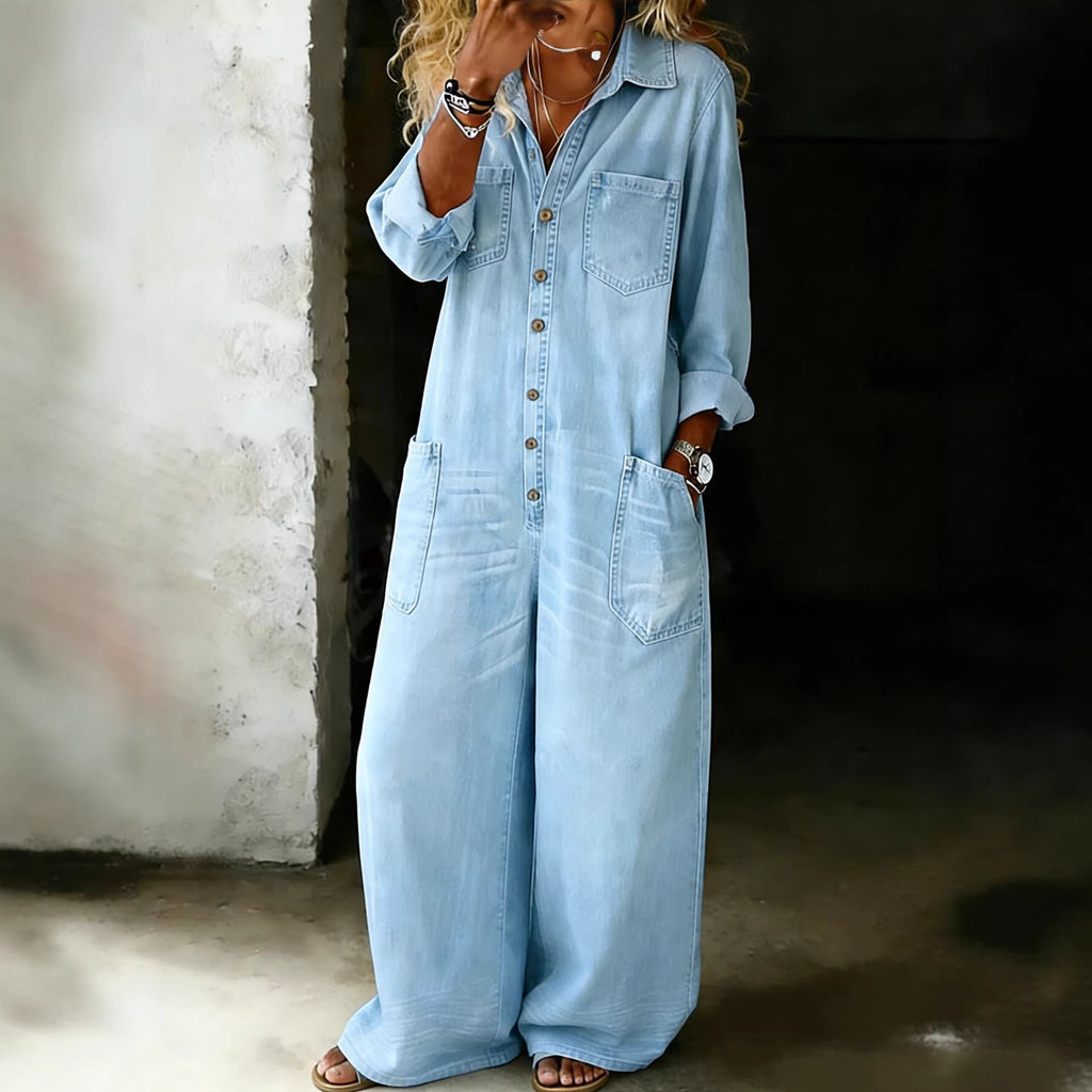 Women's vintage washed wide-leg jumpsuit with pockets by Plush Fashion Hub, featuring a relaxed fit and casual style.