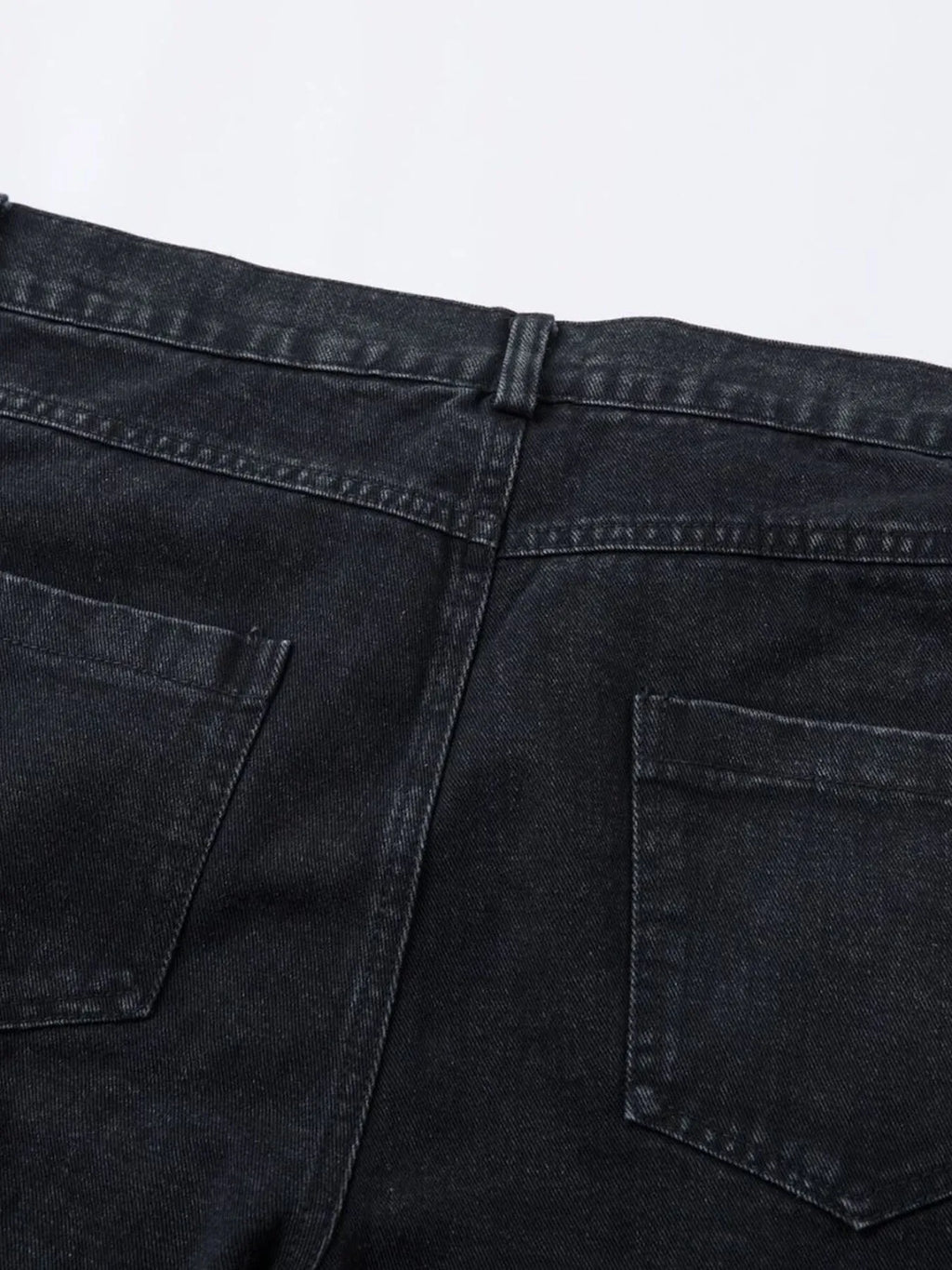 Men's wide leg denim jeans by Plush Fashion Shop, showing the relaxed fit and classic blue denim fabric.