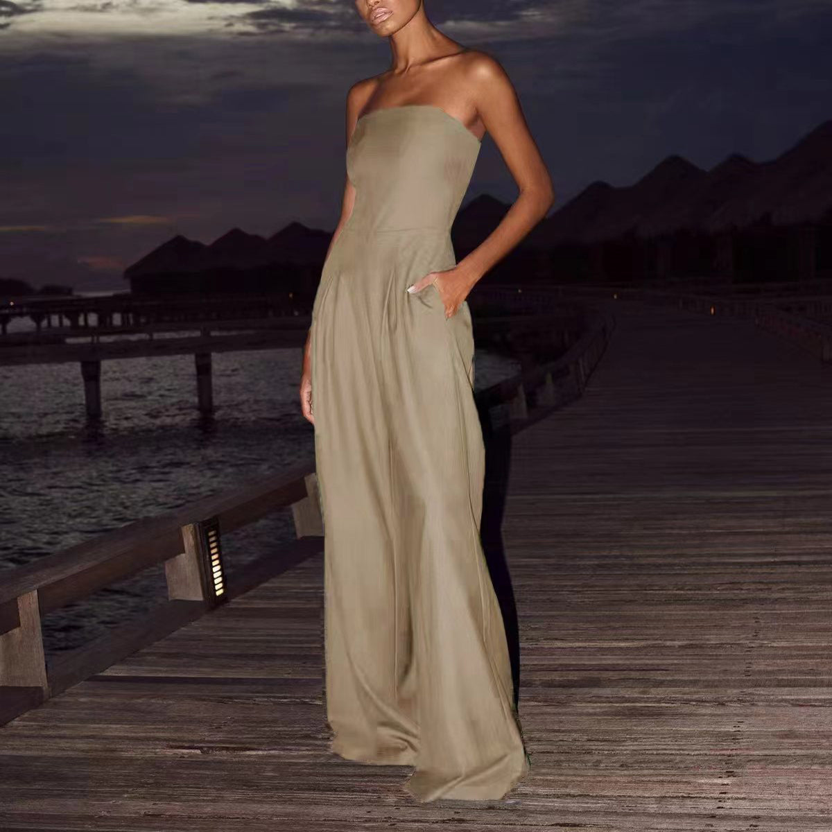 Women’s backless tube top jumpsuit with wide-leg long pants, featuring a loose fit and stylish overall design by Plush Fashion Hub.