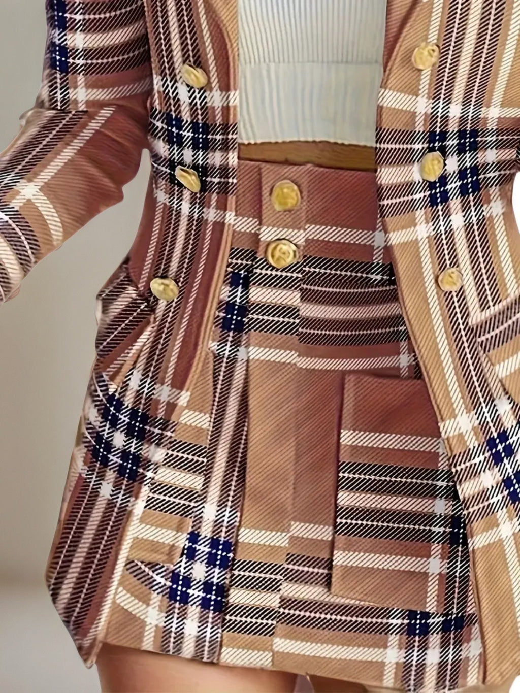 Women’s elegant plaid skirt suit set by FitiqueFit, featuring a stylish casualwear ensemble with a fitted blazer and matching skirt.