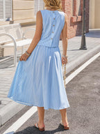 Women's striped sleeveless top and midi skirt two-piece set by Trendsi, featuring a stylish coordinated outfit perfect for warm weather.