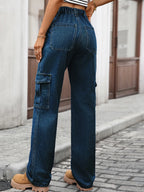 High-waisted cargo denim jeans from Plush Fashion Shop, showcasing relaxed fit and multiple utility pockets on the front and back.