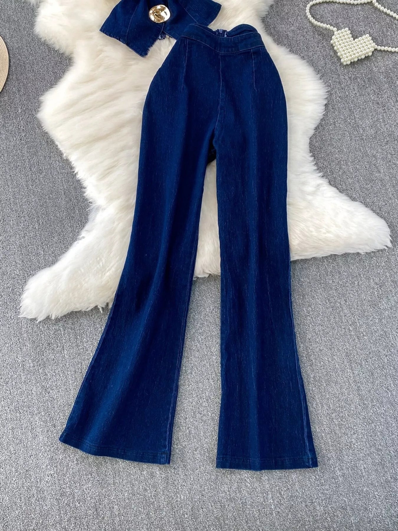 Button detail denim vest and flare jeans set by Shopimist, featuring classic blue denim with stylish buttons and a fitted silhouette.