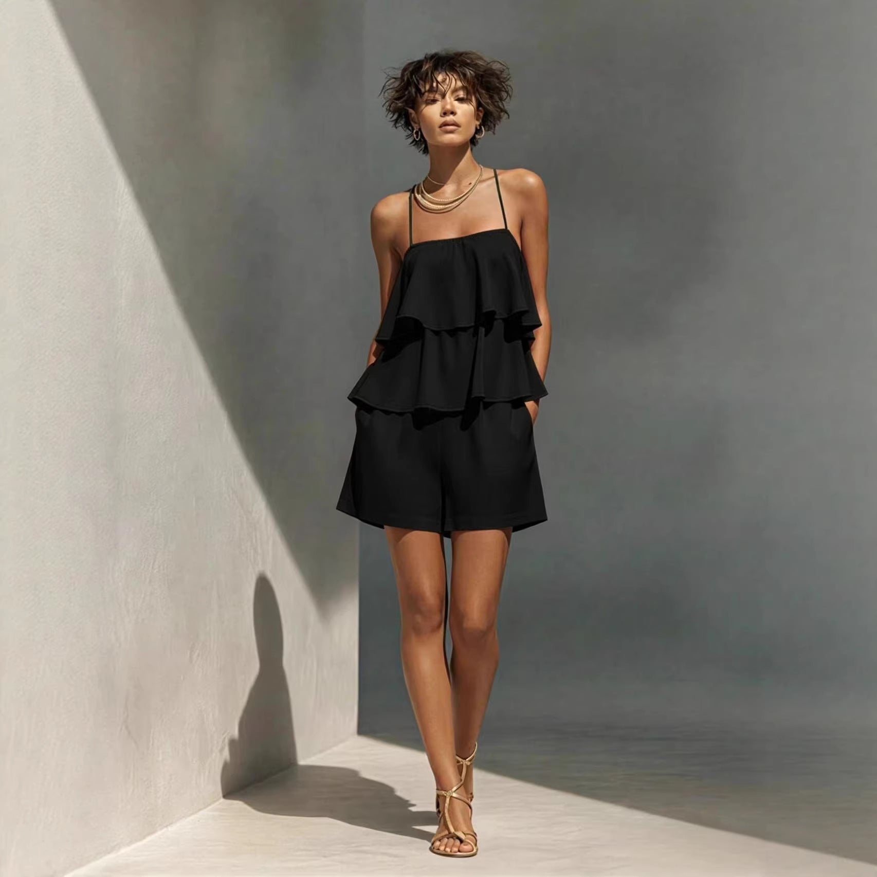 Women's multi-layer ruffle camisole and shorts casualwear set by FitiqueFit, featuring layered ruffle details and comfortable fit.