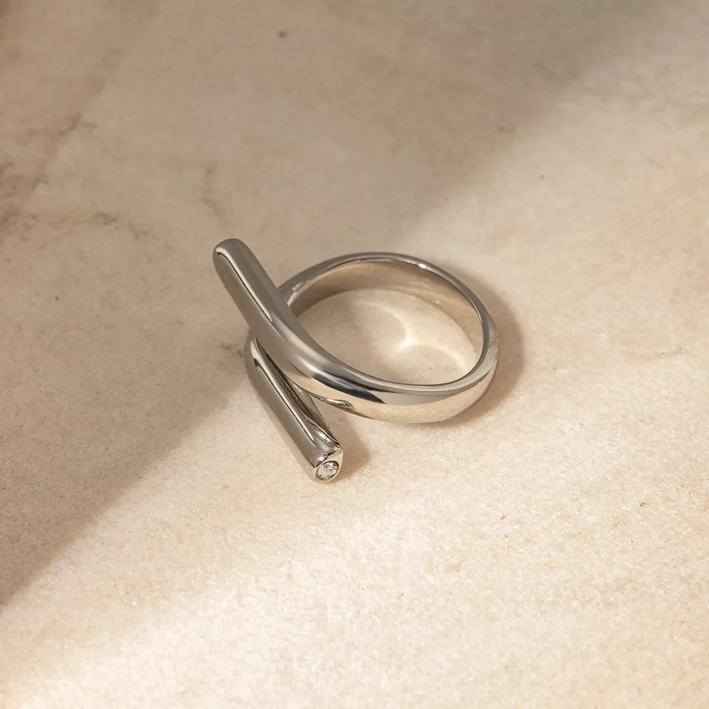 Stainless steel bypass ring from Shopimist featuring a sleek, polished design, perfect for modern jewelry styles.