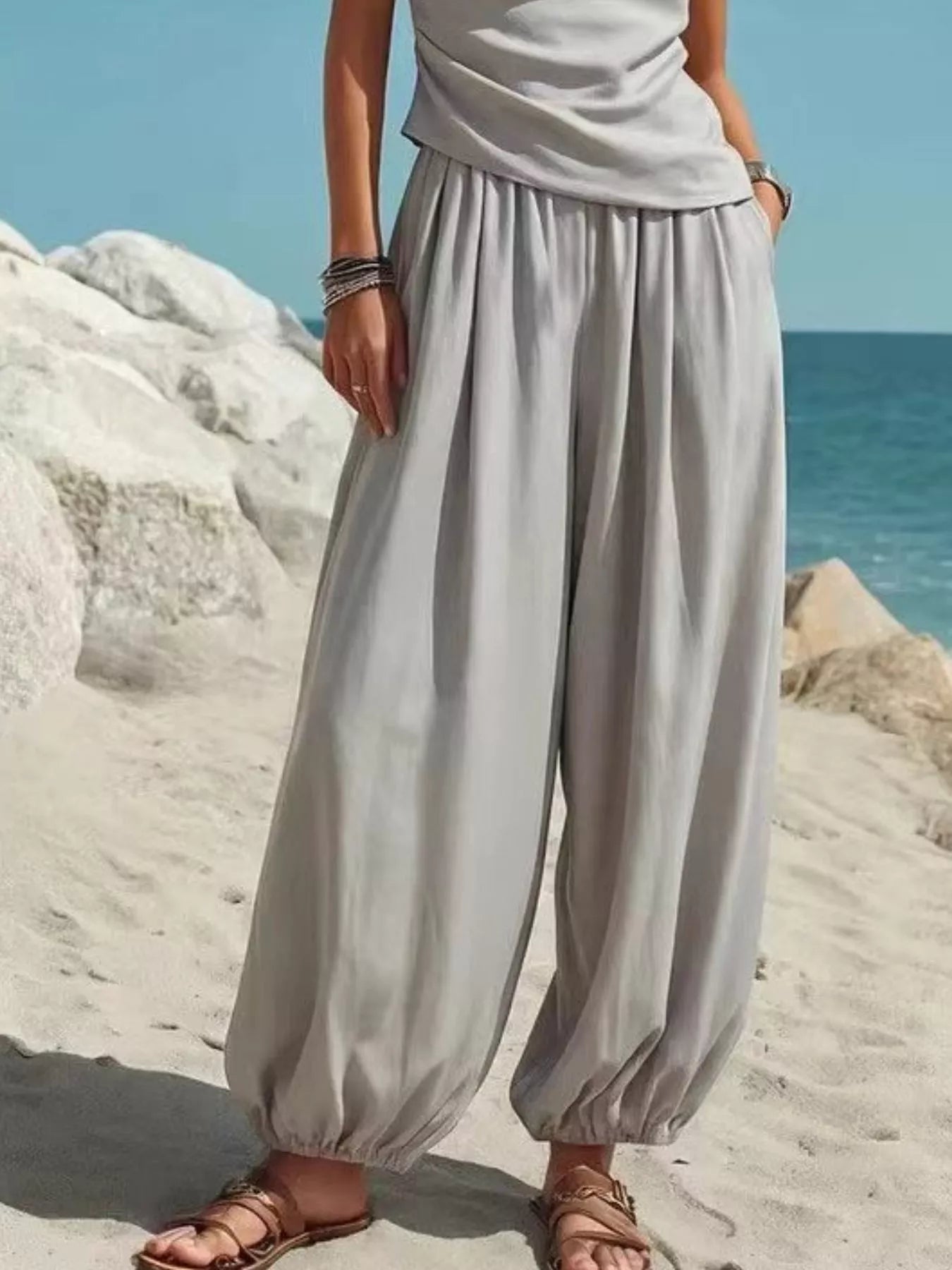 Plus size plush fashion hub one-shoulder top and wide-leg pants set, featuring a stylish coordinated piece pants set for women.