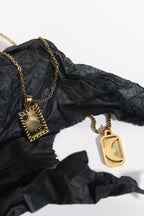 Stainless steel 18K gold-plated necklace with a delicate chain and elegant pendant, stylish jewelry by Shopimist
