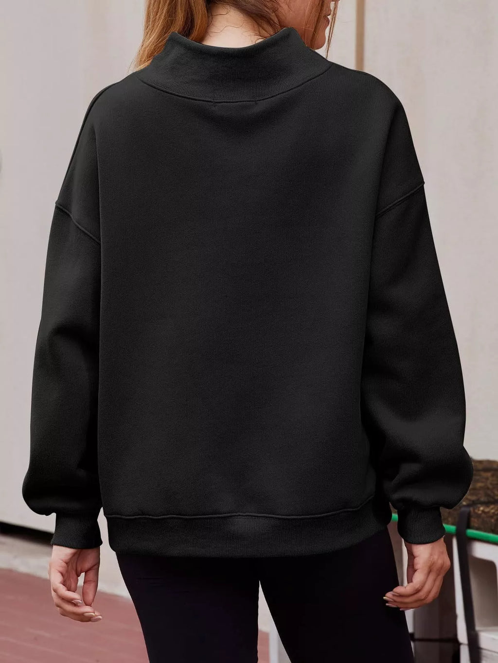 Women's oversized mock neck pullover sweatshirt with dropped shoulders, casual fit, from Trendsi, shown in a relaxed style.