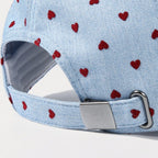 Women's heart print casual baseball hat by Trendsi, featuring adjustable fit and sporty style, perfect for everyday casual wear.