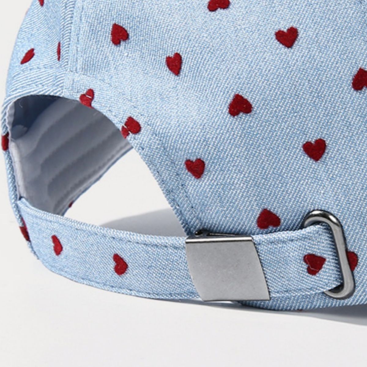Women's heart print casual baseball hat by Trendsi, featuring adjustable fit and sporty style, perfect for everyday casual wear.