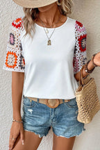 Geometric print round neck short sleeve blouse from Plush Fashion Hub, featuring a stylish modern design and comfortable fit.