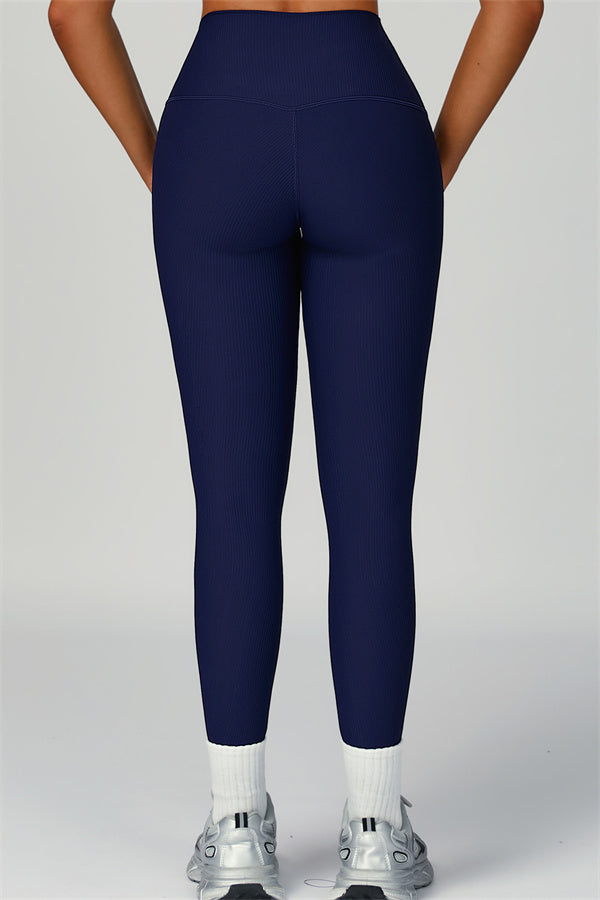 Fitglutes activewear sports bra, jacket, and leggings 3-piece set, featuring stylish workout clothes for gym and fitness activities.