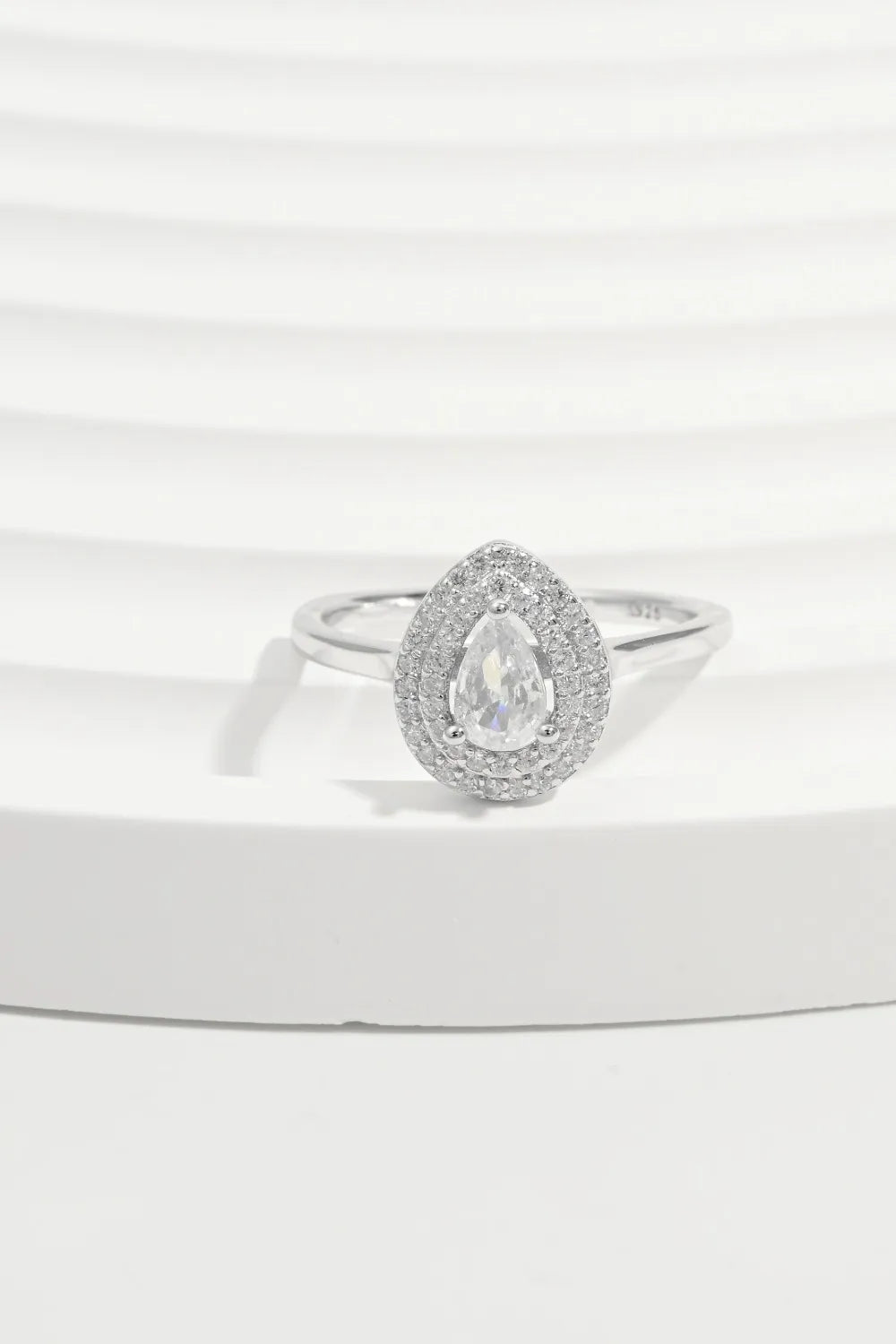 925 sterling silver inland zircon ring with a polished band and sparkling zircon gemstone, showcasing elegant jewelry design