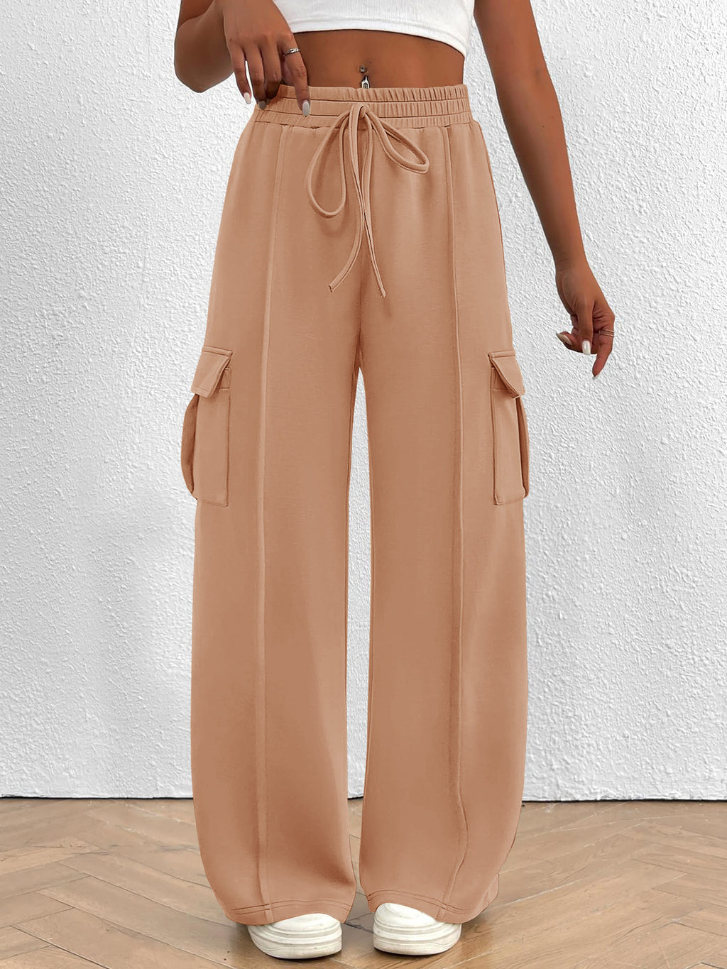 Women's high-waisted casual cargo pants with drawstring, lightweight utility pants from Trendsi, shown in a relaxed fit.