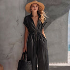 Light-colored retro resort V-neck jumpsuit with drop shoulders and loose fit, casualwear style by FitiqueFit.