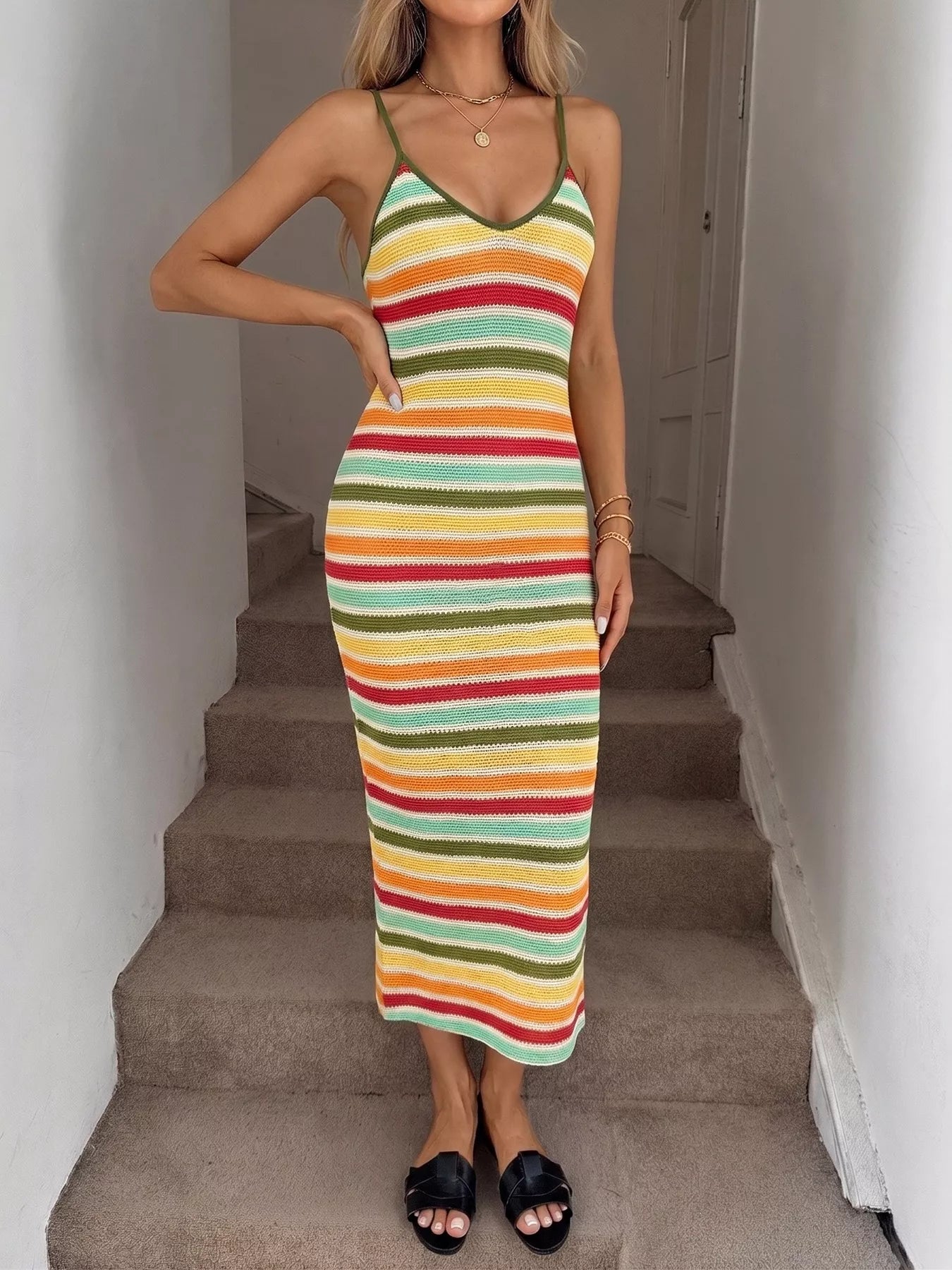 Striped bodycon knit midi dress from Trendsi featuring a fitted silhouette and bold horizontal stripe pattern.