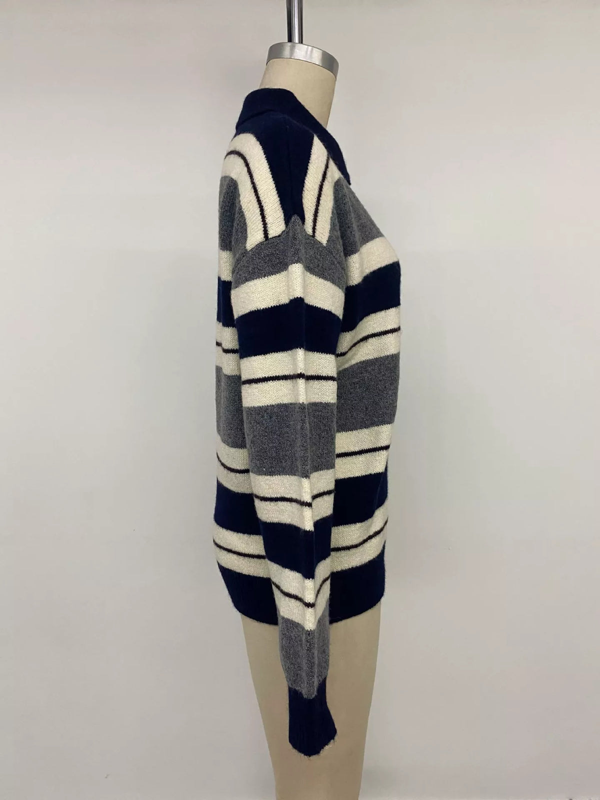 Striped long sleeve sweater by Plush Fashion Hub featuring button detail and a cozy, casual fit.