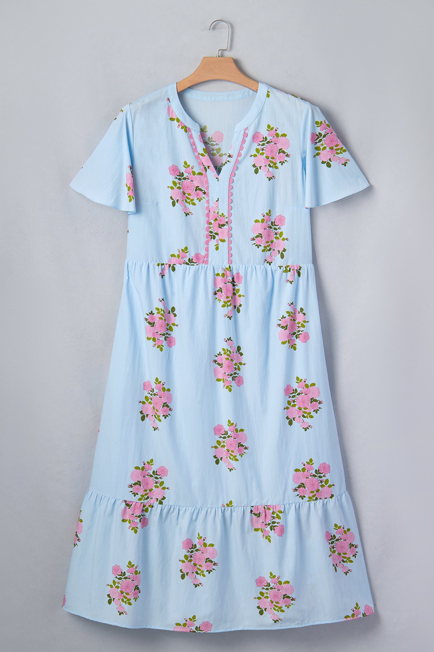 Plus size Lucy Print scalloped trim maxi dress by Threaded Pear, featuring a vibrant floral pattern and flowing silhouette.