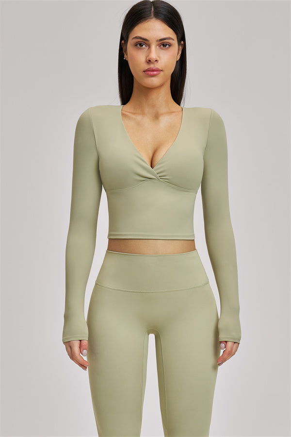 Fitglutes Activewear long sleeve crop top, stylish gymwear with fitted design, ideal for workouts and active lifestyle.
