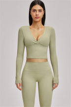 Fitglutes Activewear long sleeve crop top, stylish gymwear with fitted design, ideal for workouts and active lifestyle.