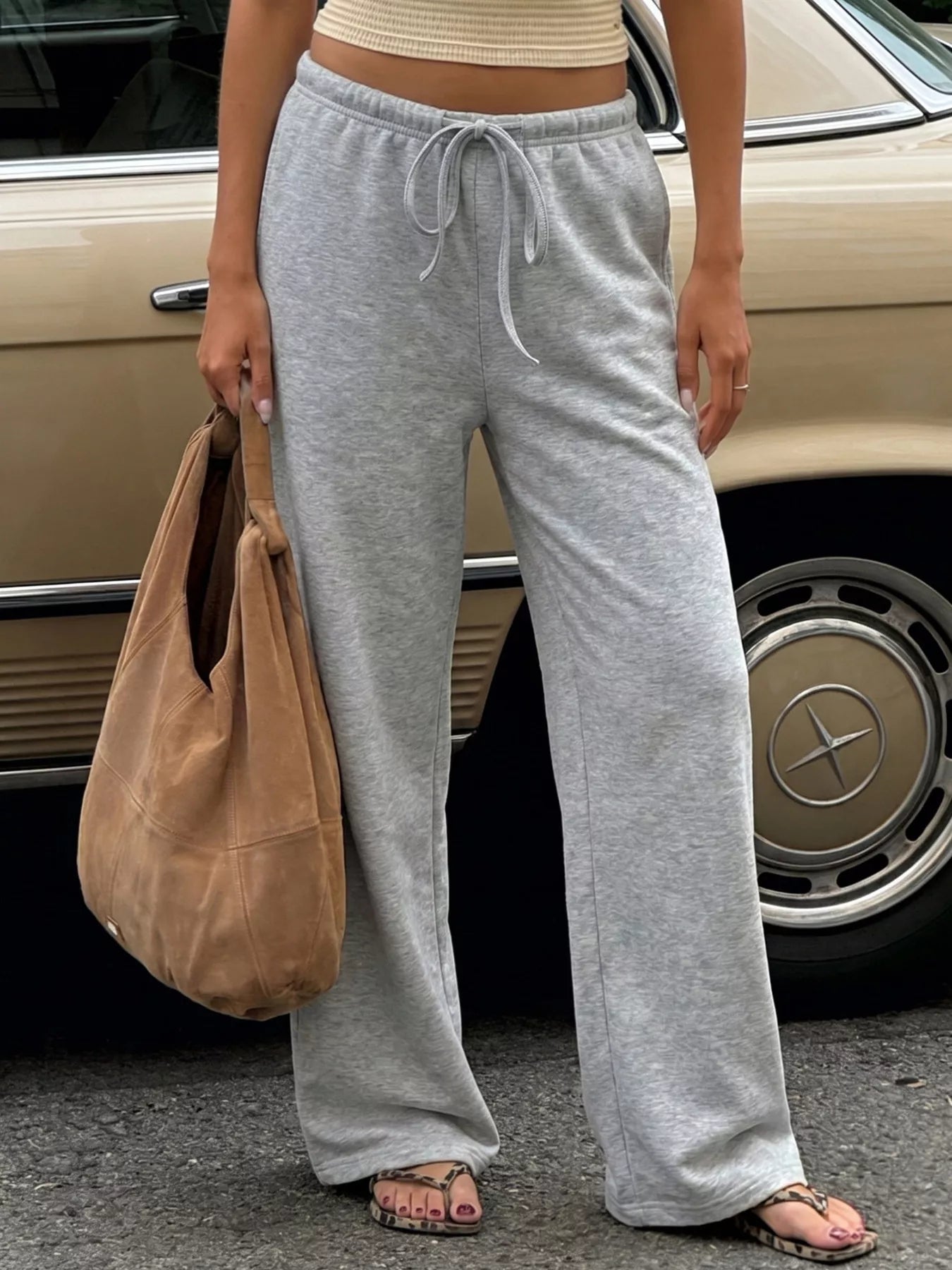 Soft Plush Fashion Hub wide-leg sweatpants with drawstring waist and plush fabric, perfect for casual and comfortable wear.