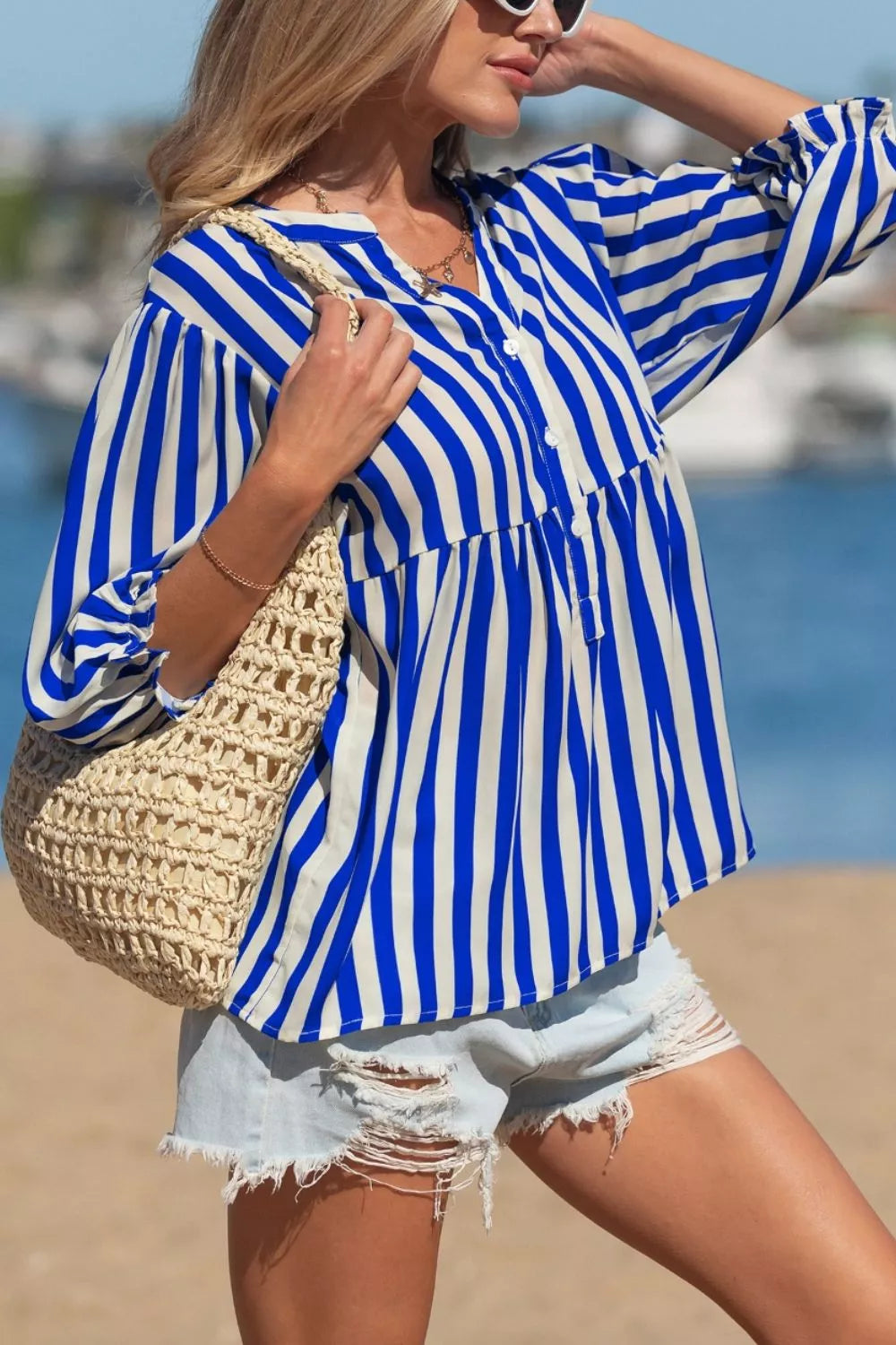 Plush Fashion Hub stripe balloon sleeve loose button-up shirt, soft fabric, stylish casual top with relaxed fit and bold stripe pattern.