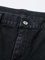 Men's wide-leg denim jeans from Plush Fashion Shop, showing the relaxed fit and classic blue denim fabric.