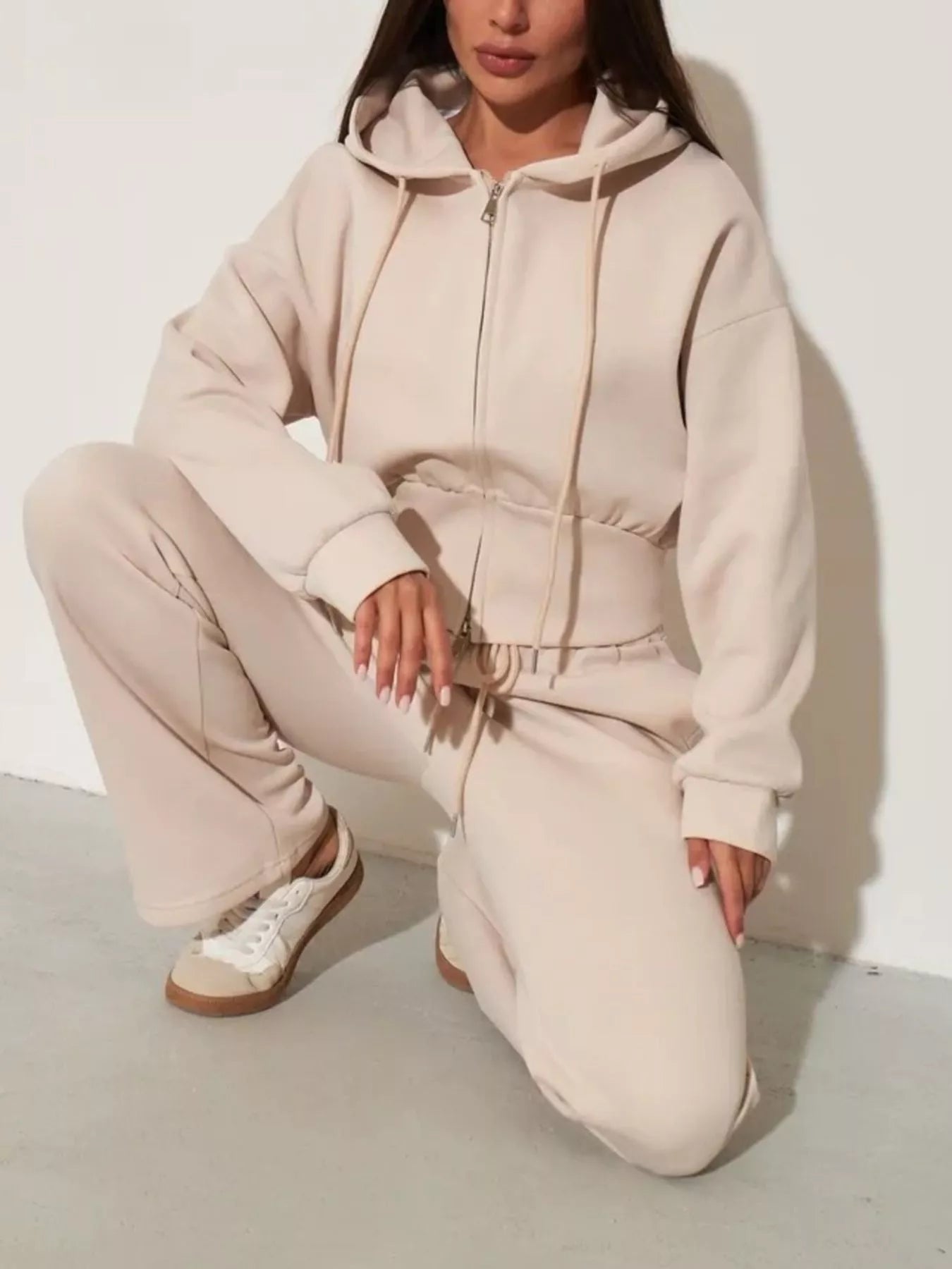 Plush Fashion Hub zip-up hoodie and wide-leg pants loungewear set, featuring a cozy, stylish design in soft fabric.
