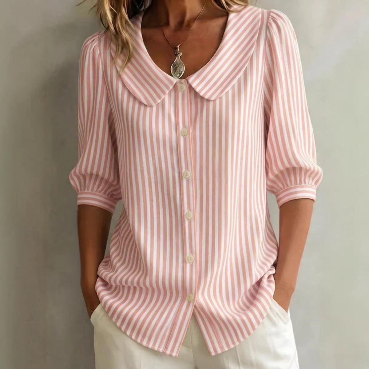 Striped V-neck top with three-quarter sleeves, casual FitiqueFit shirt, featuring a stylish and comfortable design.