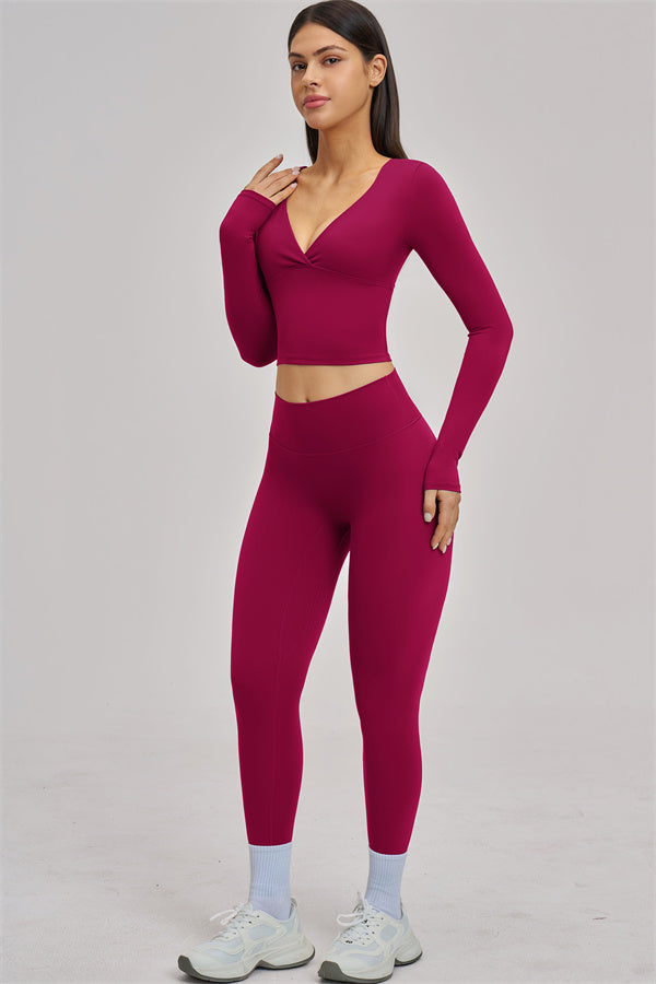 Fitglutes Activewear long sleeve crop top, stylish gymwear with a fitted design, perfect for workout and sports activities.