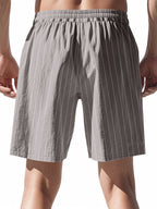 Men's plus size striped drawstring casual shorts by Trendsi, featuring a comfortable fit and stylish design.