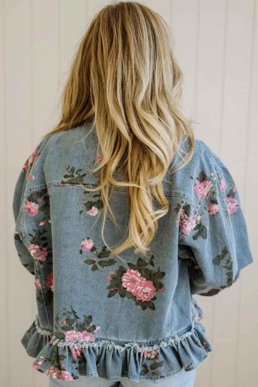 Floral print denim jacket from Plush Fashion Hub featuring ruffled hem and classic jean style with vibrant floral design.