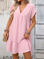 Women's casual V-neck mini dress with ruffle hem and ruched detailing, stylish and comfortable for everyday wear.