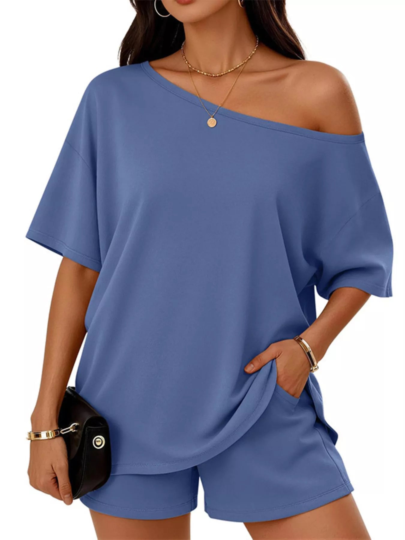 Women's plus size boat neck T-shirt and shorts lounge set by Trendsi, soft fabric, casual comfortable clothing ensemble.