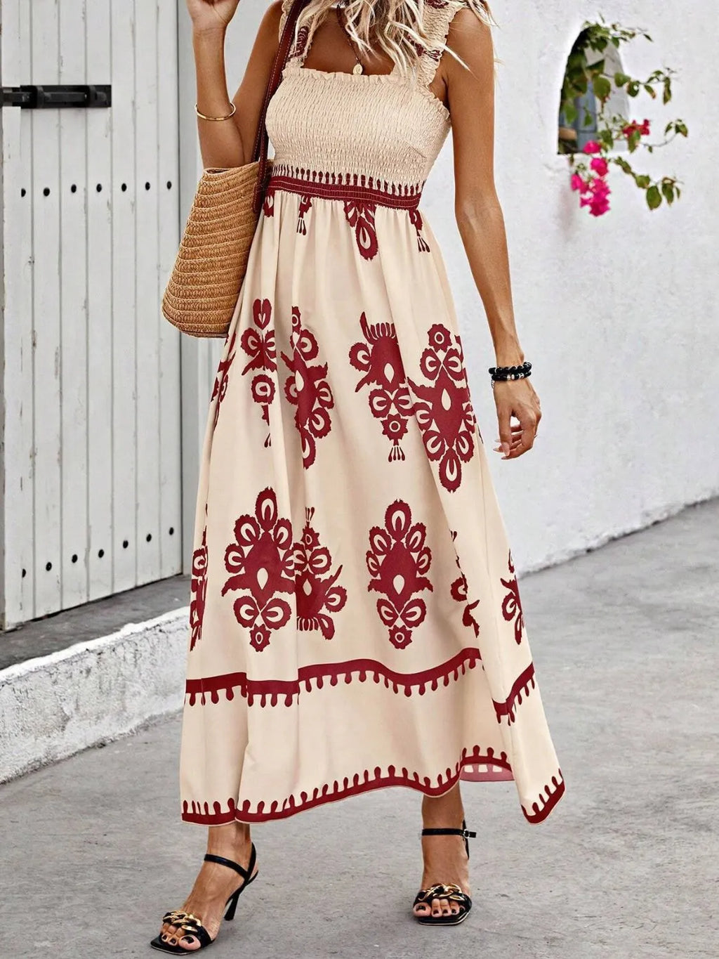 Plush Fashion Hub smocked printed wide strap maxi dress with a flowing silhouette and vibrant floral pattern.