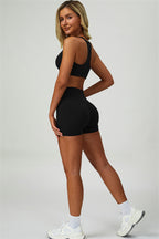 Fitglutes Activewear Seraphine sports bra and shorts 2-piece set, shown in a sleek workout outfit with supportive sports bra and matching shorts.