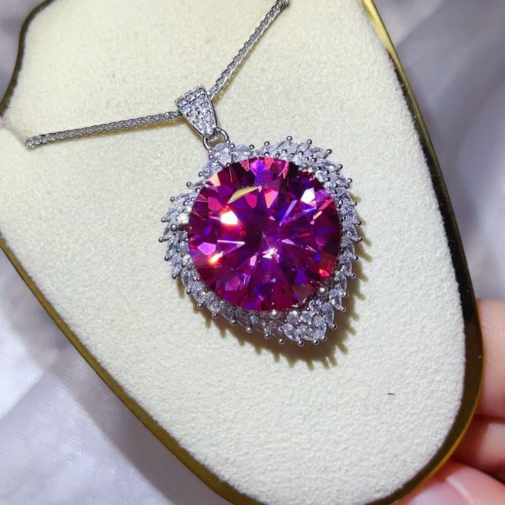 Sterling silver pendant necklace with a 20-carat moissanite gemstone, showcasing elegant jewelry design and sparkling brilliance.