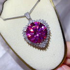 Sterling silver pendant necklace with a 20-carat moissanite gemstone, showcasing elegant jewelry design and sparkling brilliance.