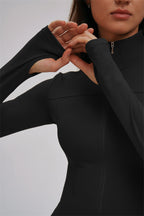 Fitglutes activewear three-piece set including Kinetic Zip Jacket, cross back sports bra, and leggings for workout and gym activities.