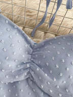 Elegant Swiss Dot Ruffled Flounce Sleeve blouse for women, featuring long sleeves and a feminine, flowing dress design.