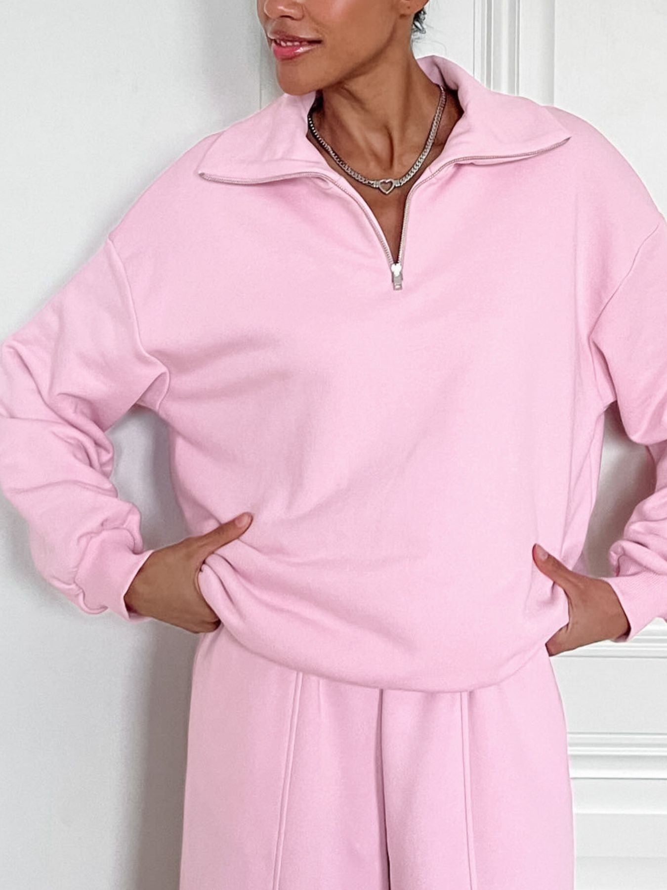 Women's quarter zip long sleeve loungewear set, stylish two-piece tracksuit in soft fabric, featuring a relaxed fit and cozy design.