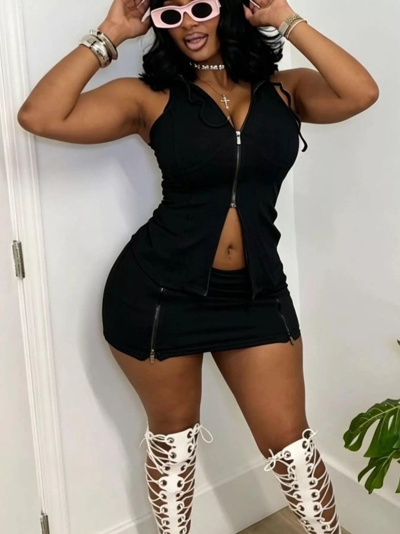 Max Origin hooded zippered sleeveless top and skirt set by Shopimist, featuring a modern two-piece design with a stylish hood.