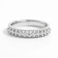 925 Sterling Silver Zircon Inlaid Ring with intricate design, showcasing sparkling zircon stones on a polished silver band.